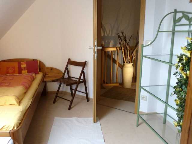 Im gemütlichen zweiten Schlafzimmer